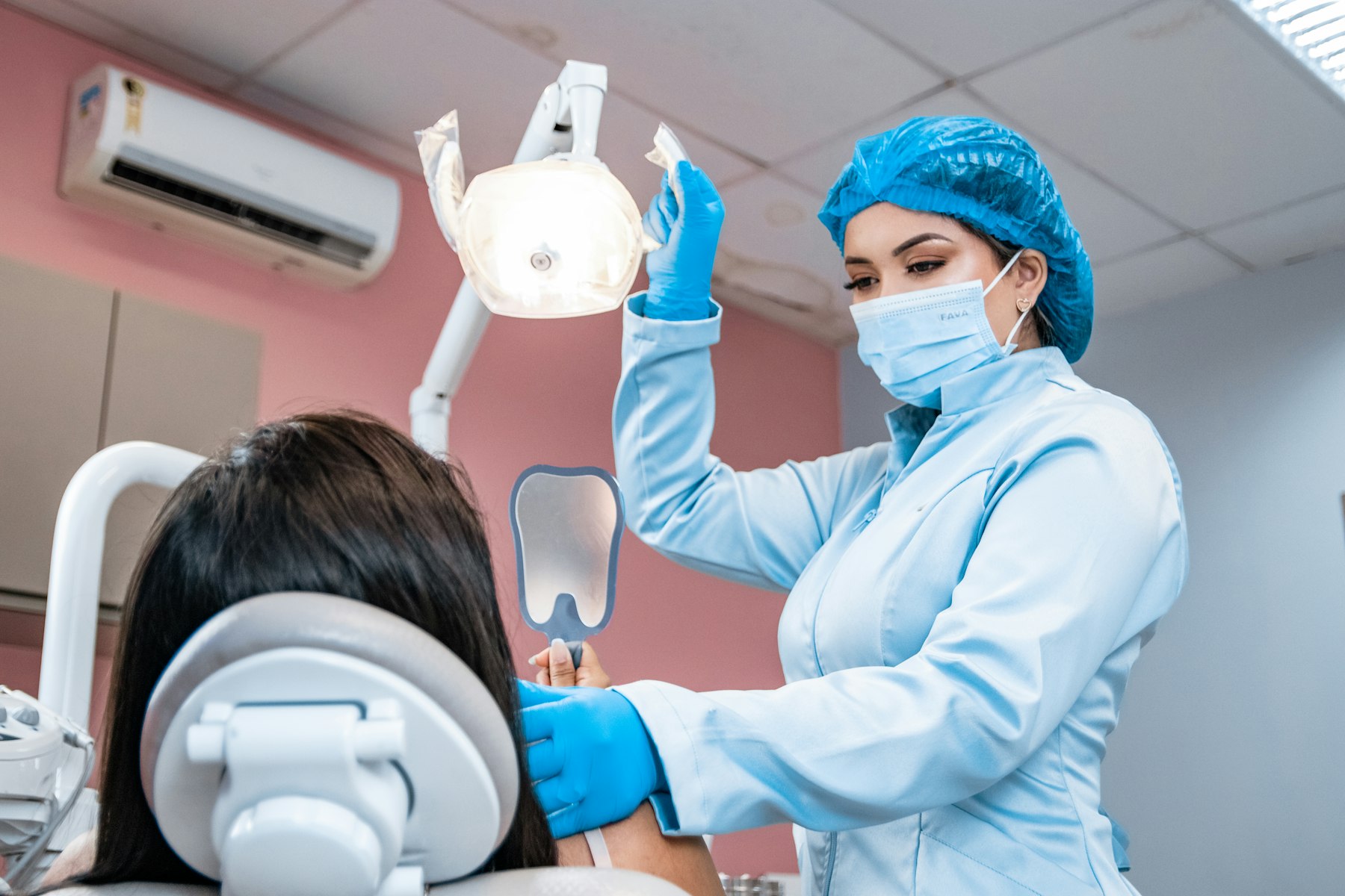 Dentist reviewing restorative options with a patient.